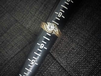 14 karat Gold and Diamond Wedding Ring. Size 7. $500