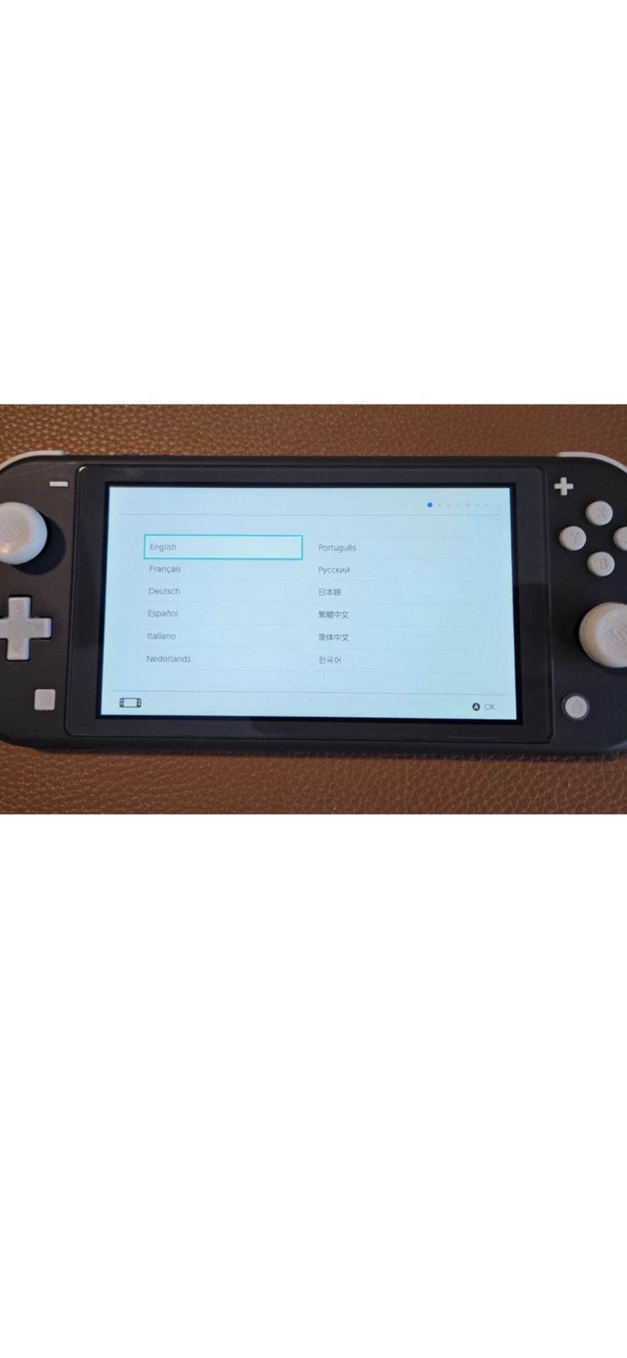 Nintendo Switch Lite Great Condition With 4 Games