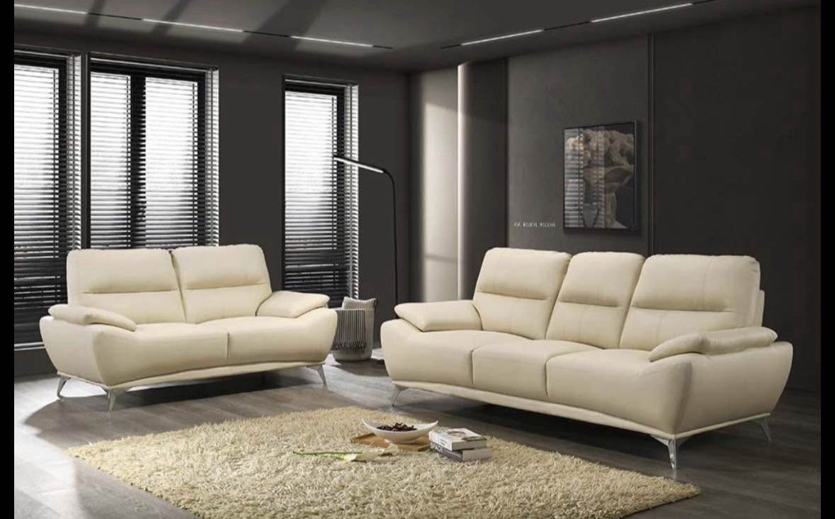 Fourth of July sale. Valencia cream colored sofa and loveseat set now $699. Easy finance option. Same-day delivery