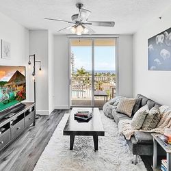 Gray Futon Couch With Side Tables 