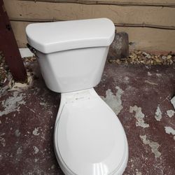 TOILET AND BATHROOM VANITY 28 3 /4 WIDE WITH SINK AND FAUCET 