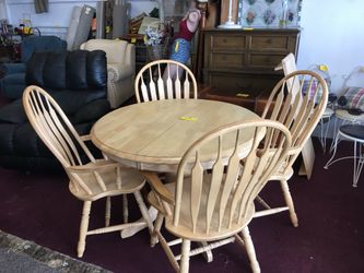 Table with four chairs and one leaf
