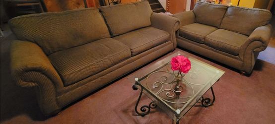 Broyhill Rolled Arm Couch and Love seat.