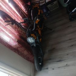 It's A Nakto Plus Electrical Bike Good Brakes Yellow  Is The Color