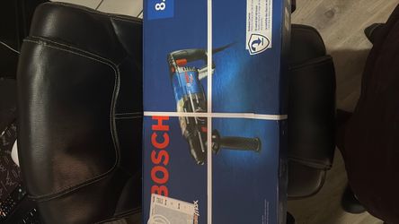 Bosch Rotary Hammer Drill in Box