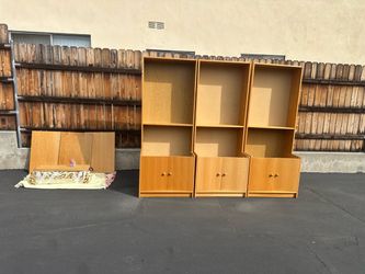 A Modern Three Piece Maple Wall Unit