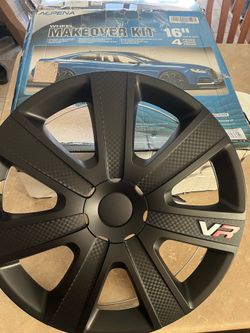 Wheelcovers, New 16” Carbon W/Rings.  See photos
