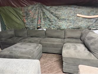Five piece grey couch with ottoman so six pieces total good condition clean we sell all the time delivery $40 local