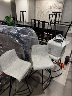 3 white barstool chairs