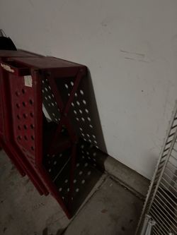 Red metal car ramp