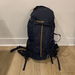 Kelty Catalyst 50L Hiking BackPack with Cabela's Backpack Cover  Good pre-owned condition. Also includes a Cabela's Backpack Cover that folds into its