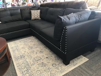 Nailhead upholstered sectional