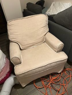 Beige chair with ottoman