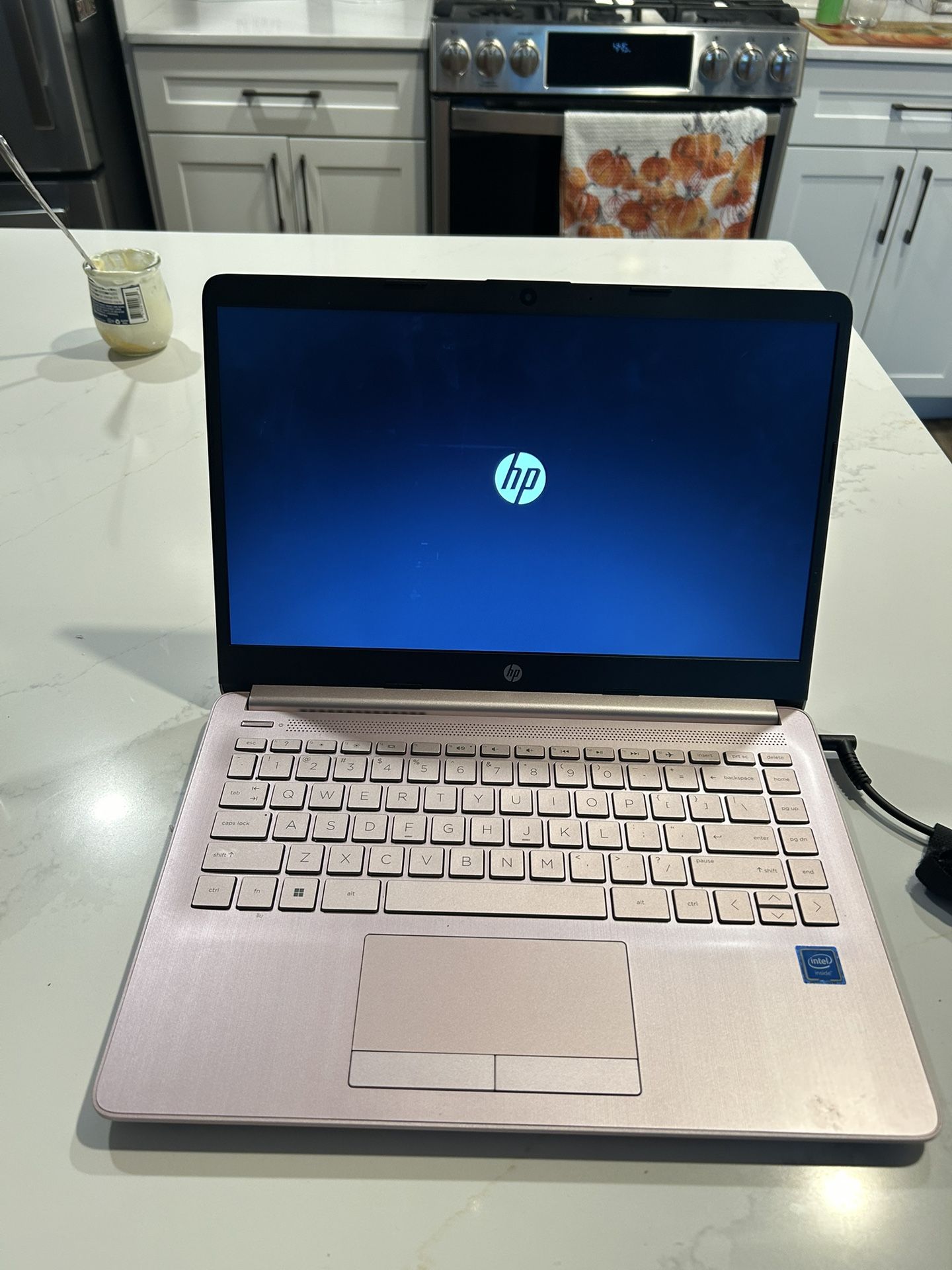 light Pink HP laptop