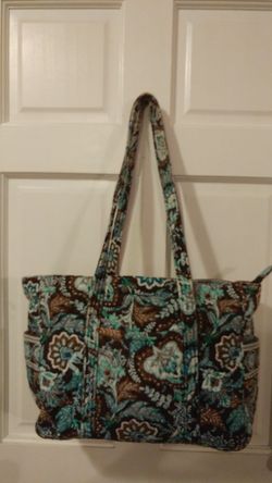 Very cute Vera Bradley tote bag strap has a little peeling to the top see third picture