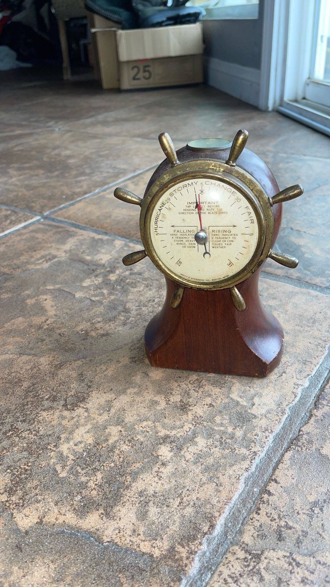 Antique nautical-style aneroid barometer