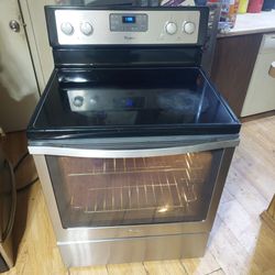 Whirlpool 5 Burner glass top stove with Agua Lift Self Clean Convection Oven.  Works Like New