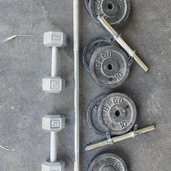 Standard size weight plates set with dumbbell handles, barbell and Hex dumbbells 