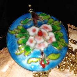 Enameled pendant On Metal