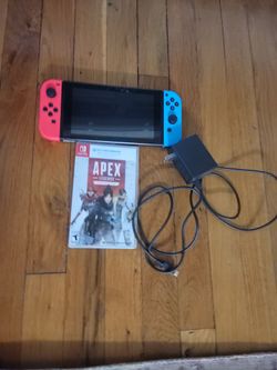 Nitendo switch with charger and Apex legends