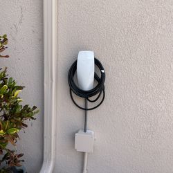 Tesla, EV charger, Nema 14–50 plugs, all EV wall charger, search protectors, electrical panel