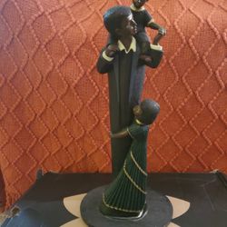 Father And Children Statue