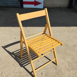 Single solid wood fold up chair like new