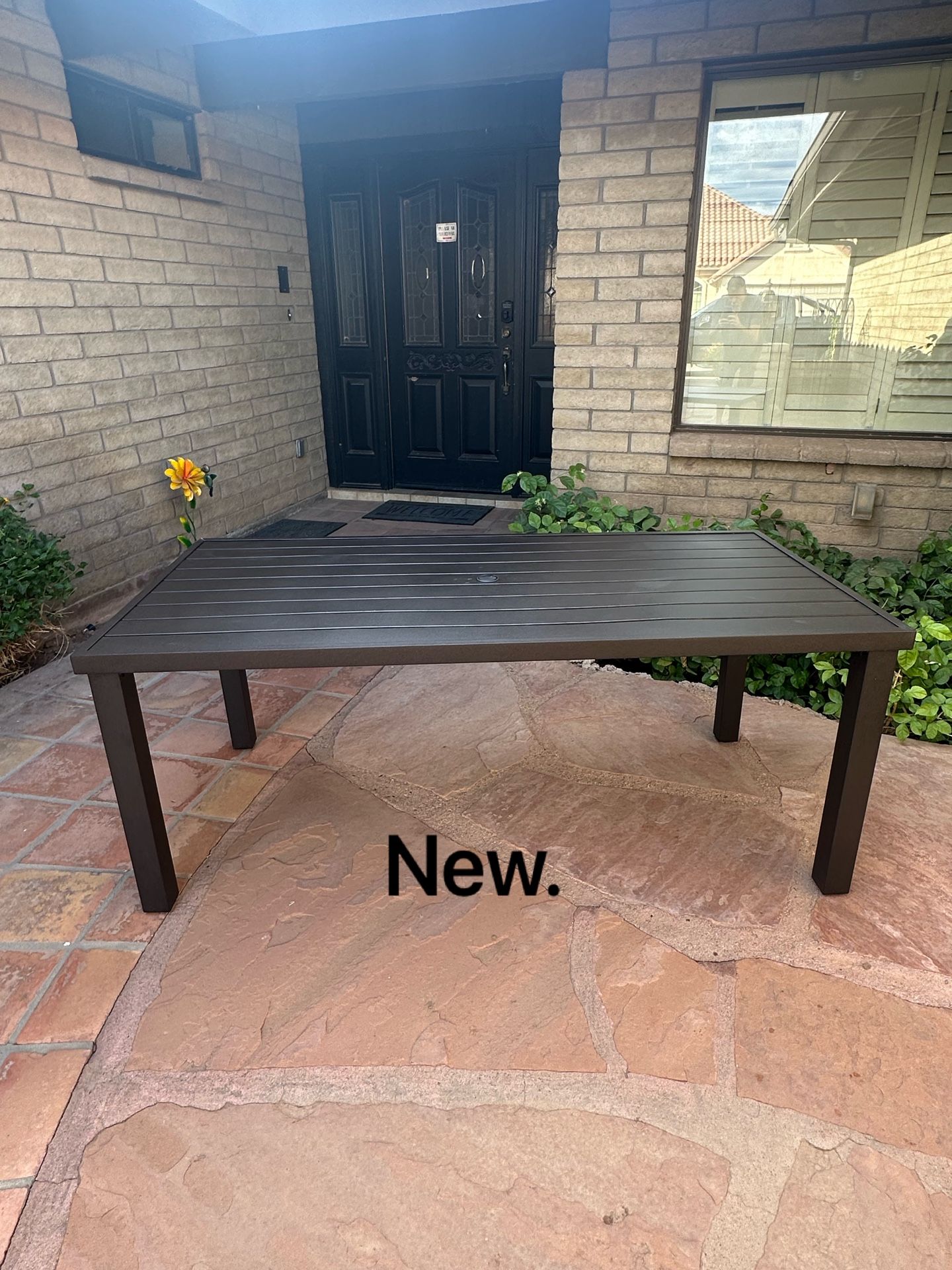 Table. (New). Outdoor Patio Furniture. Dining Table. Metal.