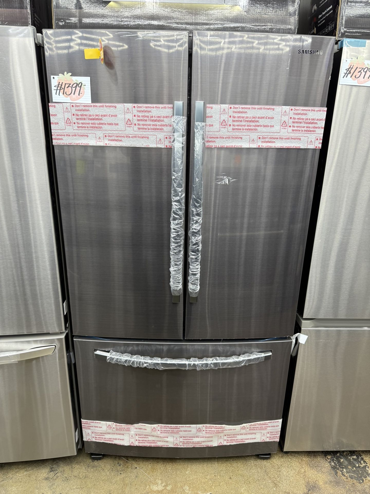 Brand new Samsung stainless steel french door refrigerator