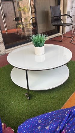 Round two-tier coffee table with white glass top