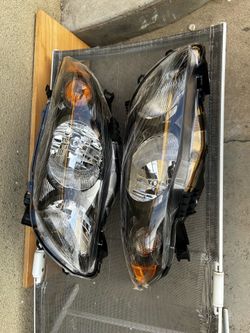 2009-2010 Toyota Corolla Headlights Left & Right Pair (New)