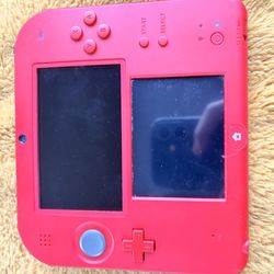 Red Nintendo 2ds with mario kart
