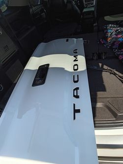 2013 - 2023 Toyota Tacoma white tailgate