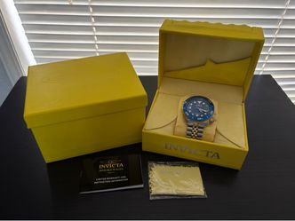 Invicta men’s blue faced wrist watch