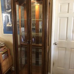 Beautiful China (Curio)Cabinet with glass shelves. Vendors Cabinet display.