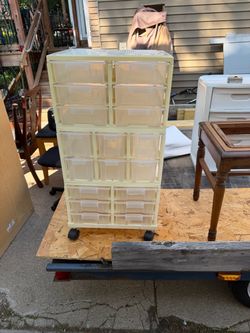 Plastic Storage organizer , with 18 drawers, 3 sections,on wheels13 deep, 16w, 31 high, $15