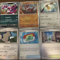 Poké Pad And Drapion Or 22 Random Pokemon Cards 