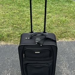 Used Essentials Black Carry On Rolling Travel Luggage Bag