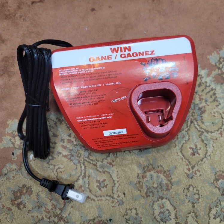 New Milwaukee m12 battery charger ( tool only)