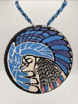 Handcrafted Beaded Eagle Medallion - Soaring Spirit
Handcrafted beaded medallion featuring a Native American