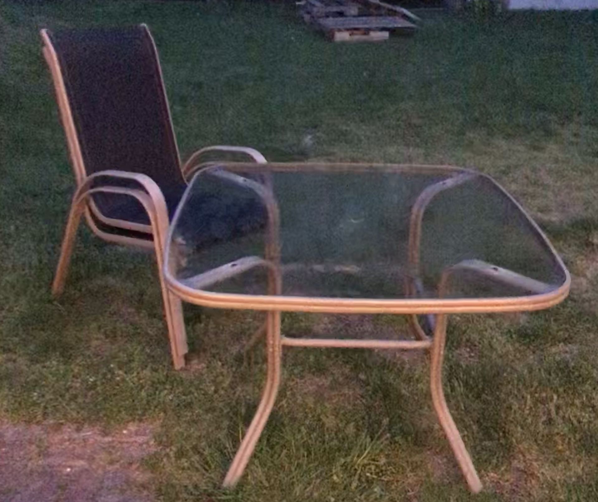 Glass patio table and chairs, decent shape