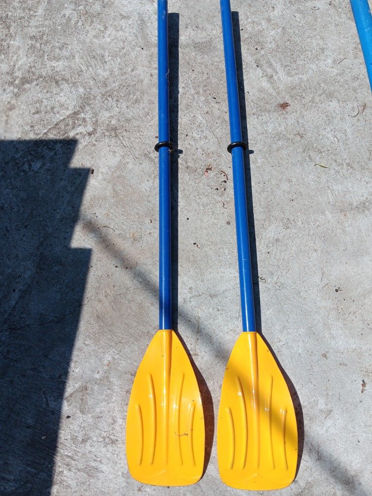 Two Plastic oars. 45"long