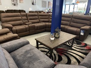 Photo Large brown power reclining sectional