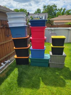 Lot of 16 empty,plastic with lids, different size boxes.