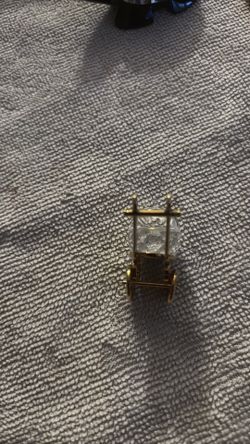 Miniature baby carriage stroller with gold trim