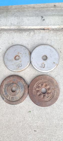 100 lbs. Set of 9  Standard iron  standard weight plates with a 1-inch hole