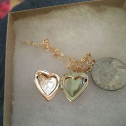 Gold over silver heart locket necklace