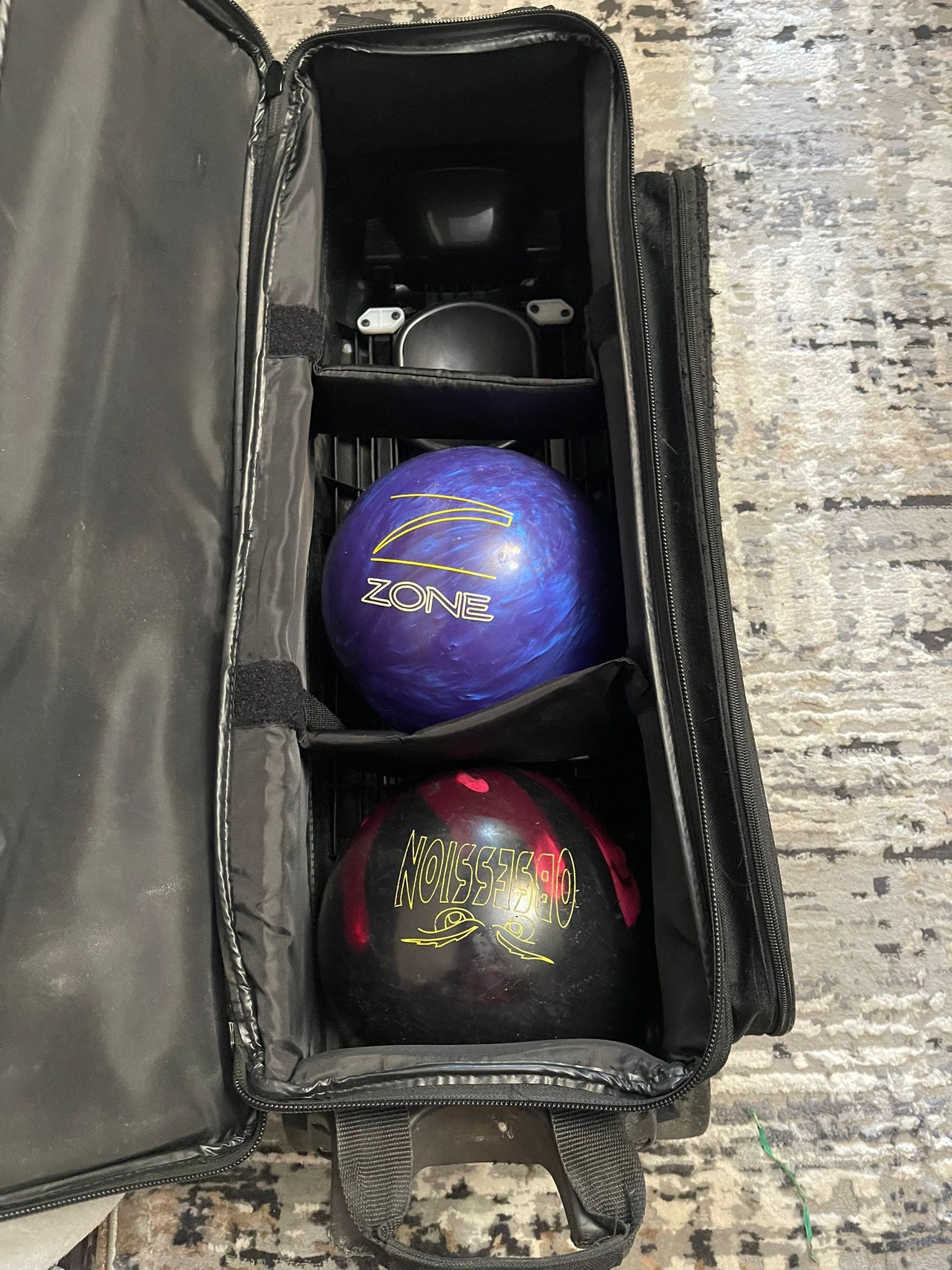 two bowling balls with the bag (one side is a little damaged) comes with 2 gadgets the bowling balls in excellent condition They weight 8 lbs each