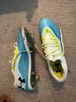 Women’s size 11 under armor elite cleats