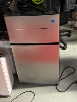 Silver Frestec mini fridge